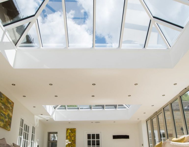Glass roof panels pictured from inside a house